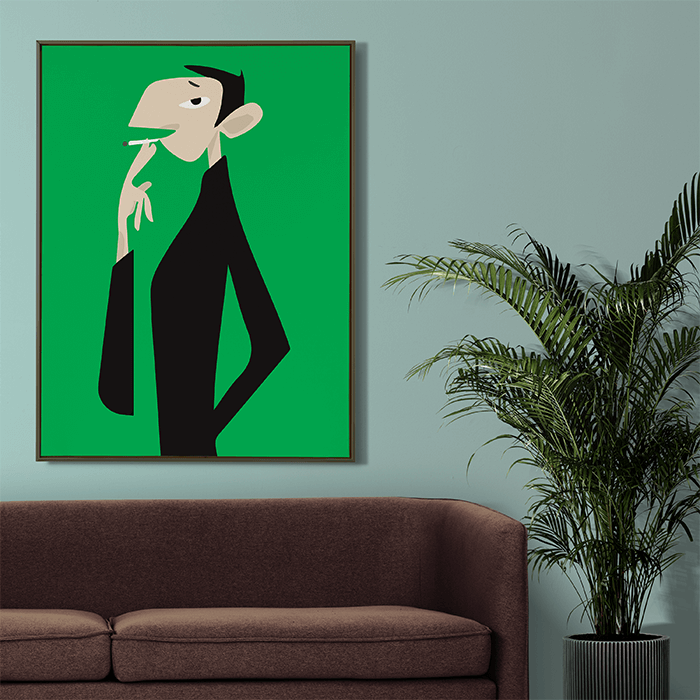 L’affiche Gainsbourg sur fond vert, encadrée au-dessus d’un canapé brun, sur un mur vert d’eau