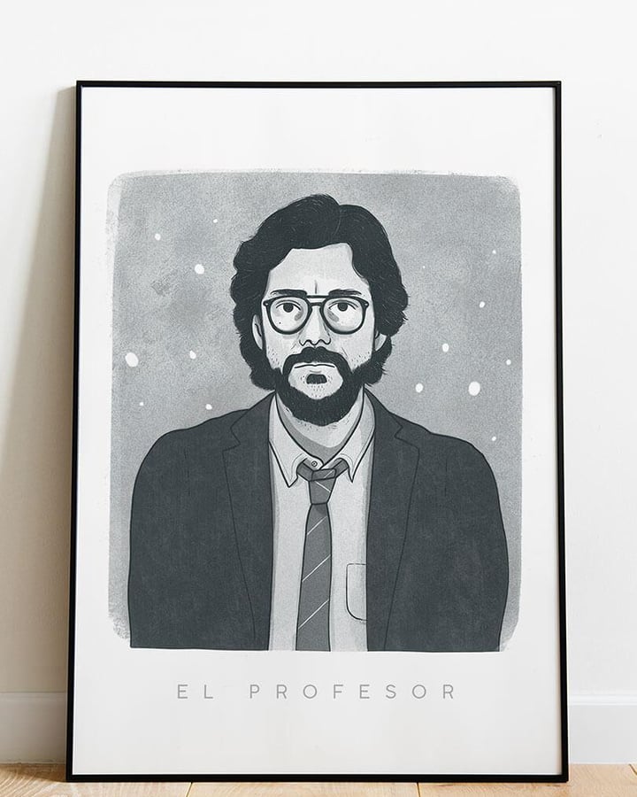 L’affiche El Profesor dans un cadre noir, posée sur un parquet contre un mur blanc